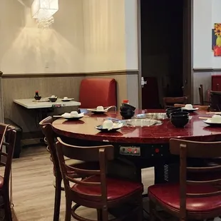 a table and chairs in a restaurant