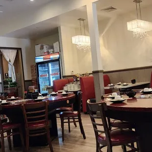 a restaurant with a large screen