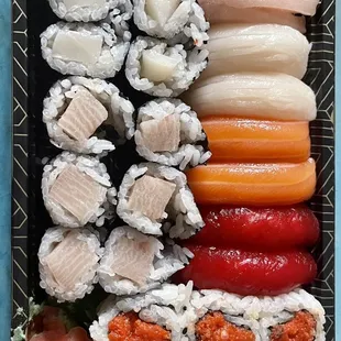 Deluxe Nigiri Sushi dinner with an additional yellowtail roll and white tuna roll