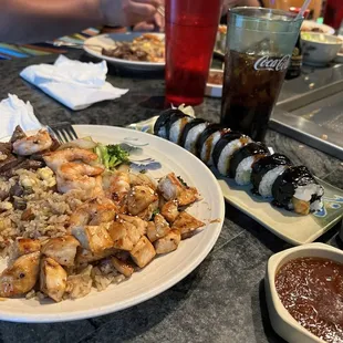 Chicken, shrimp and steak combo with fried rice  "Fat boy" sushi roll