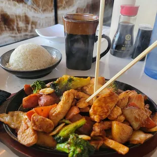 Lunch order of Szechuan Chicken With steamed rice - salad or soup was also included.