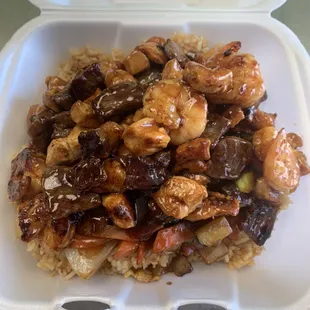 TRIO HIBACHI. ( chicken, steak, and shrimp) with your choice of fried rice or lomein noodles, and vegetables! $18