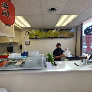 a man sitting at a counter