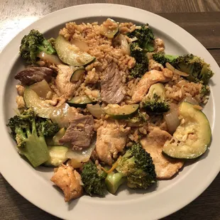 Japanese dinner of chicken and beef plus broccoli before adding their delicious yum yum sauce!