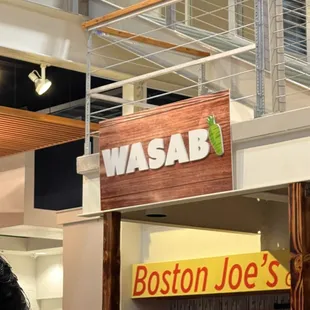 a man standing in front of a store