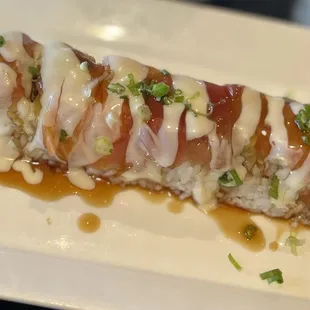 Kings Fusion Roll~ This amazing roll had a nice array of sauces &amp; succulent lobster, snow crab, tuna, salmon and albacore taste delicious!