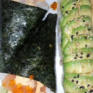 Spicy scallop and Salmon handrolls, bamboo roll