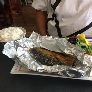 Saba- shioyaki excellent taste. I believe it was grilled then broiled in foil. Skin on, Filet of a smaller mackerel makes for a good meal.