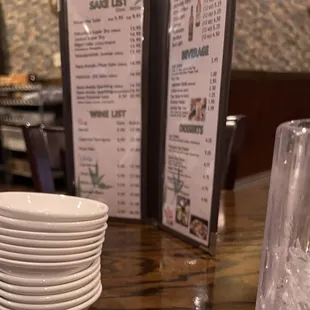 Stack of Sauce plates left at the table.