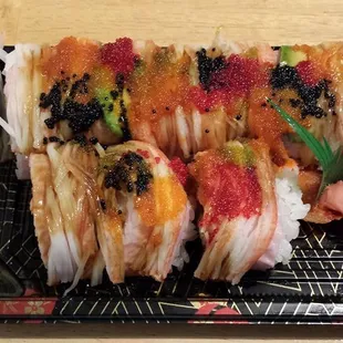 a plate of sushi on a table