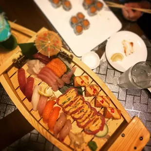 Love boat with salmon lover's roll and sweet heard roll