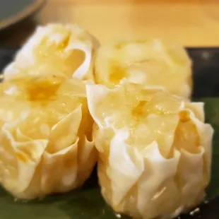 The shumai with a drop of sesame oil which added a woody/nutty layer to the steamed shrimp dumplings, genius