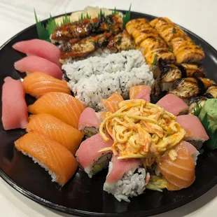 Small platter with salmon, tuna, wasbiko , California, and one other that I forgot the name to, and eel.