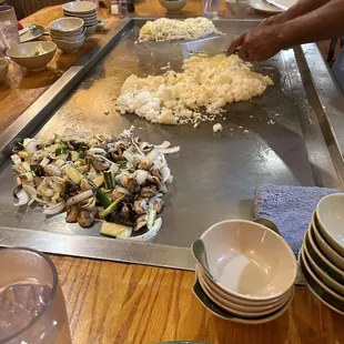 a man making a pizza