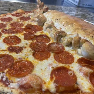 Combo of Pizza, garlic knots and Calzone