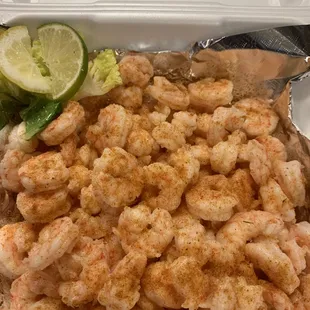 shrimp and vegetables in a styrofoam container