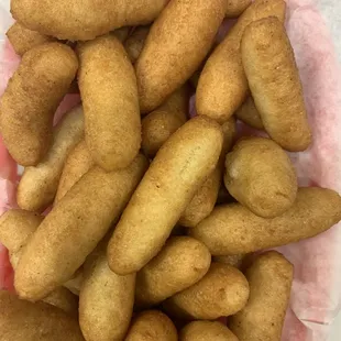 a basket of fried crab fingers