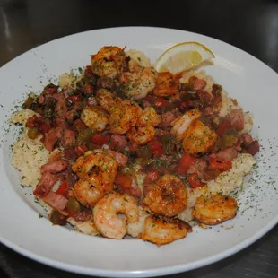 a plate of shrimp and rice
