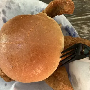 Catfish sandwich with one side (corn on the cob) - $7