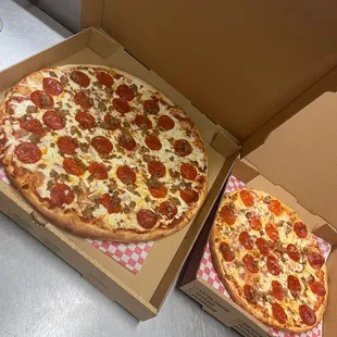 two pepperoni pizzas