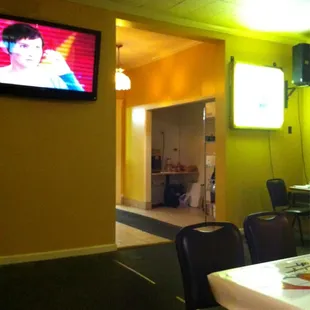 Large flat screen with two dart sets on left (not pictured)