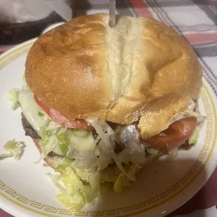 Dino burger -1/2 lb burger lettuce tomato onion cheese and bacon with mayo