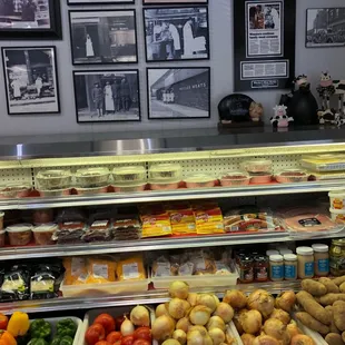 a display of meats and vegetables