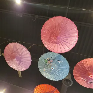 Parasols hanging from above.