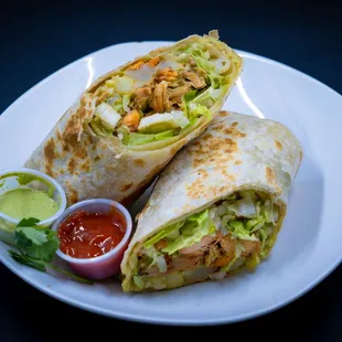 two burritos on a white plate