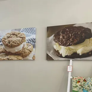 two ice cream sandwiches hanging on a wall