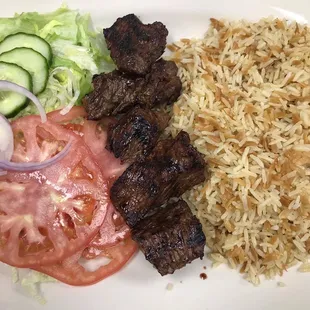 Marinated Steak tip dinner with rice pilaf and a side salad. Come and enjoy.