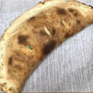 Not just mouth watering pizza but calzones just as delicious.