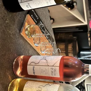 three bottles of wine on a table