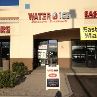 a sign in front of a store