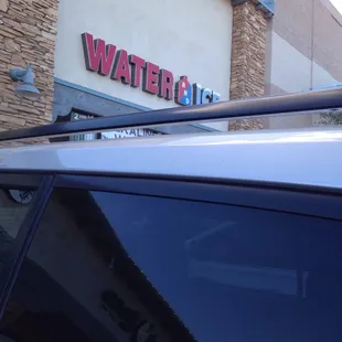 a car parked outside of a store
