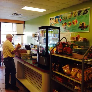 a man standing at a counter