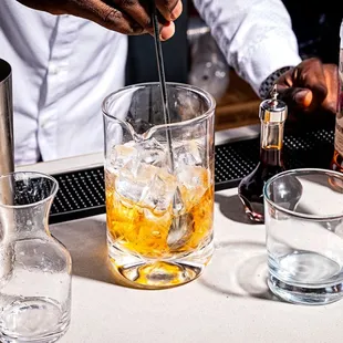 a bartender mixing a drink