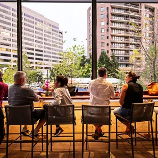 a group of people sitting at a table