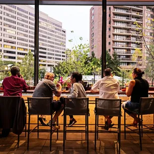 a group of people sitting at a table