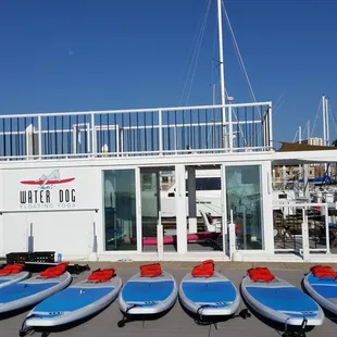 Water Dog's Floating Yoga Studio houseboat and boards