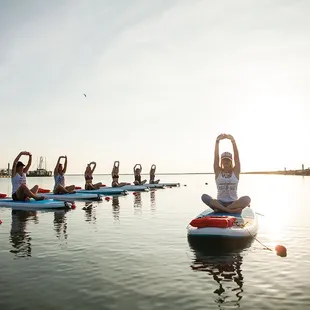 SUP (Stand Up Paddleboard) Yoga, Pilates and fitness classes on the water
