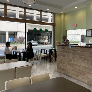 The side where you pay with patrons eating