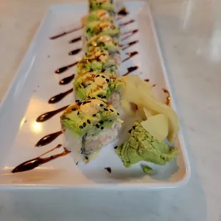 DINO &amp; JIMMY **  ALASKAN CRAB MEAT, TEMPURA SHRIMP, CUCUMBER, AVOCADO, SCALLION,  KABAYAKI GLAZE, SRIRACHA AIOLI, SESAME AIOLI