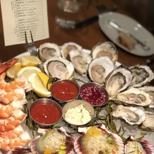 Something you should never pass up , seafood platter . So fresh and the scallops are delish !