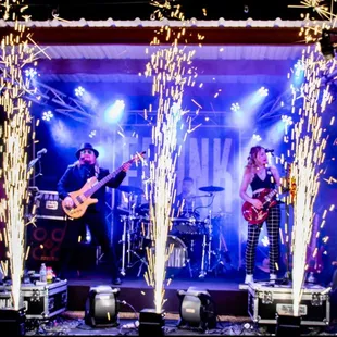 the band performing on stage