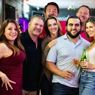 a group of people posing for a picture