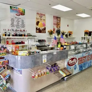 a man standing in front of a counter