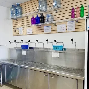 a stainless steel sink in a commercial kitchen