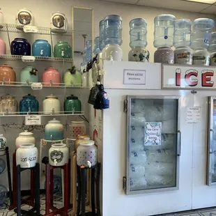There are lots of glass and plastic containers for sale.