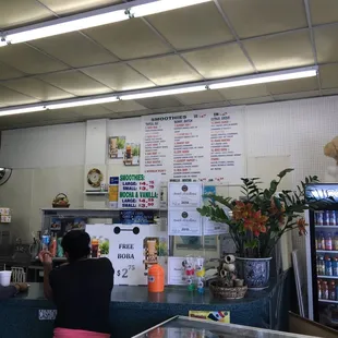 a woman standing at a counter